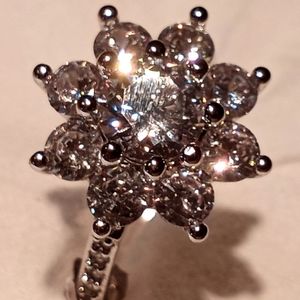 White sapphires and cubic star ring.